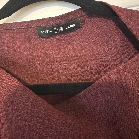 The Riley Plum Wrap top by Meem - such a unique and beautiful and flattering top - Picture 4 of 6